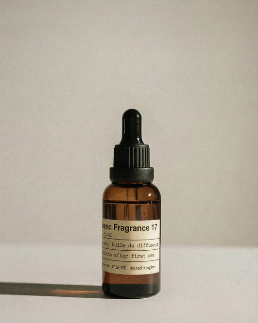 Charabanc No. 17 Winds of Darjeeling essential oil in the signature amber glass apothecary bottle.