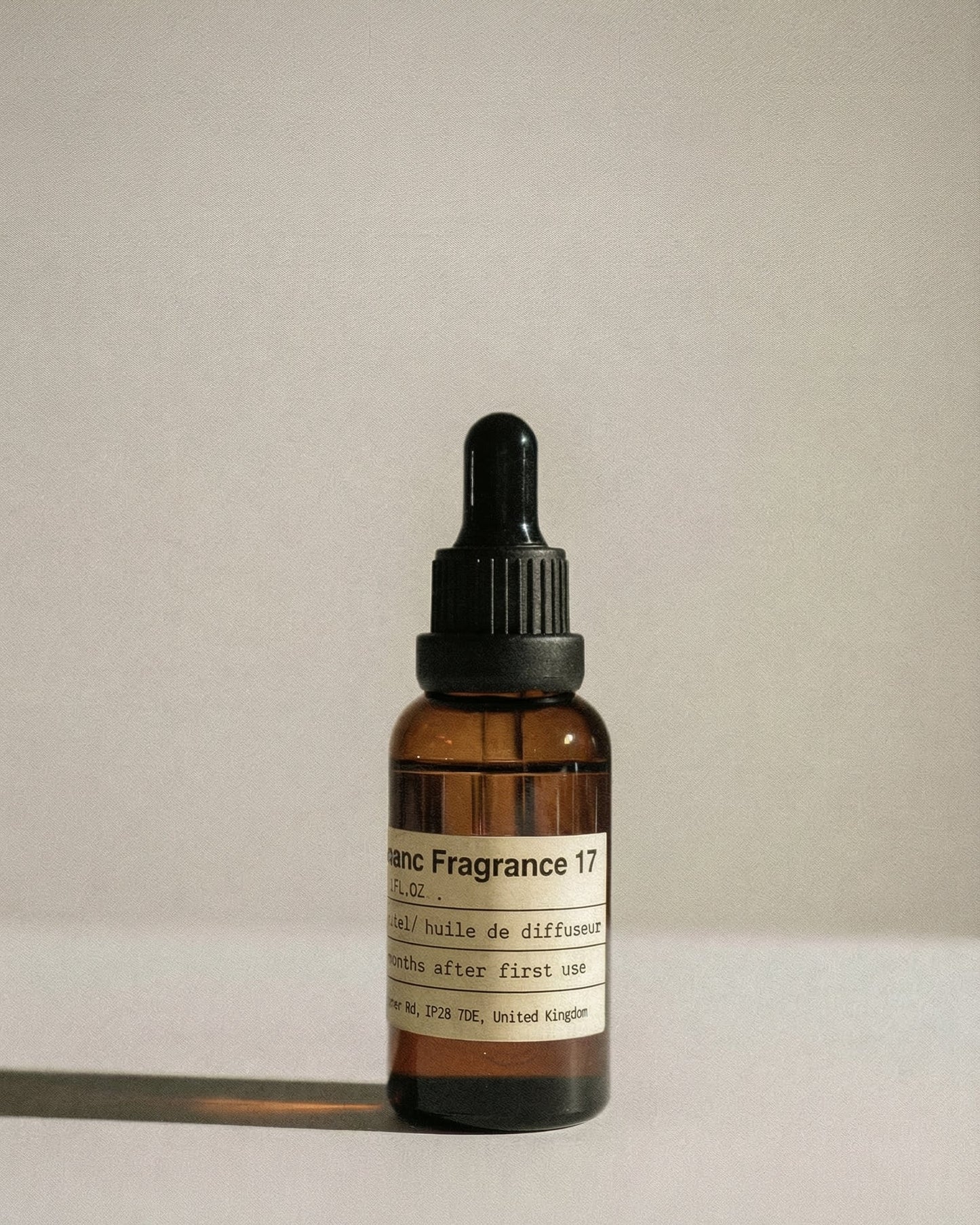 Charabanc No. 17 Winds of Darjeeling essential oil in the signature amber glass apothecary bottle.