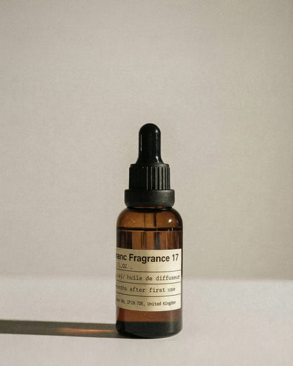 Charabanc No. 17 Winds of Darjeeling essential oil in the signature amber glass apothecary bottle.